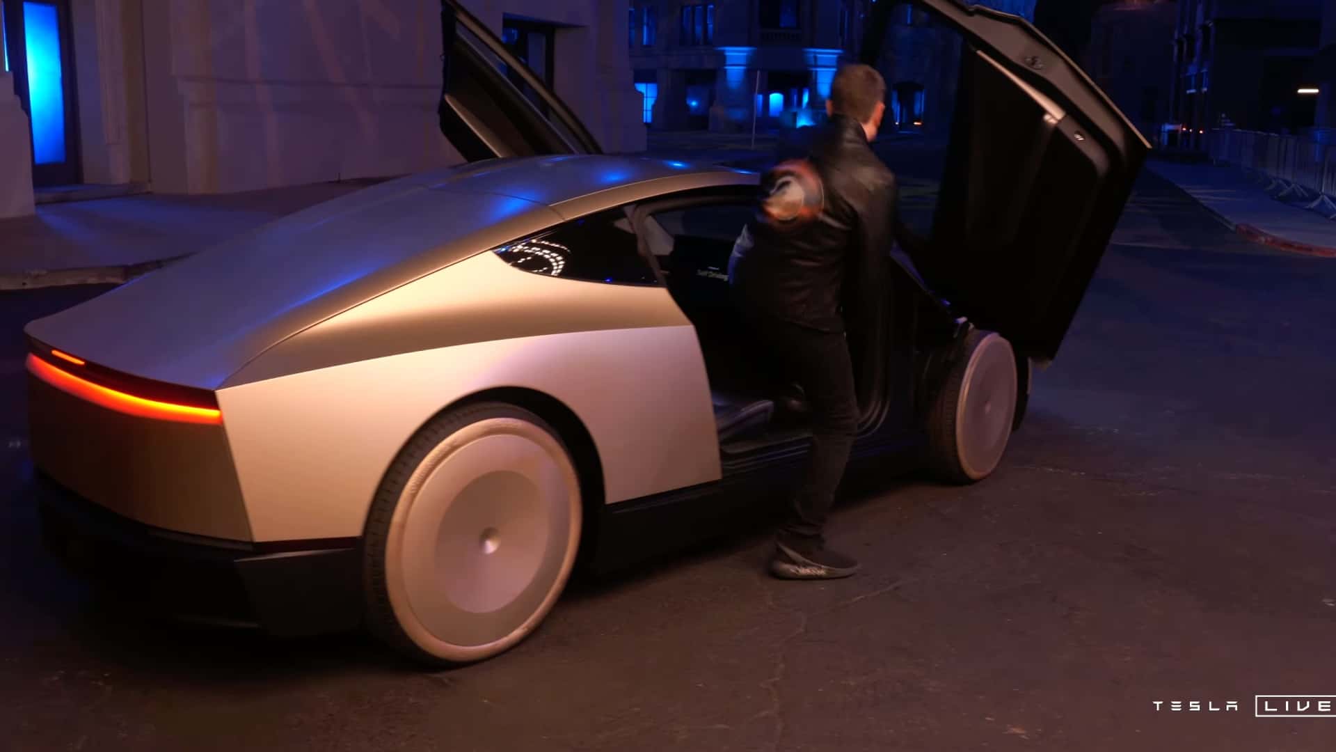 Elon Musk unveils self-driving taxi that will "leave passengers" and sometimes have no steering wheel or pedals